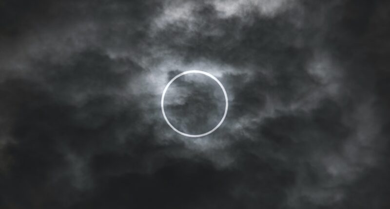 moon covered with grey clouds