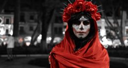 a woman with makeup and a red scarf around her neck