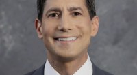 Retrato oficial de Kevin Warsh, presidente de la Reserva Federal de Estados Unidos, con traje oscuro y fondo claro